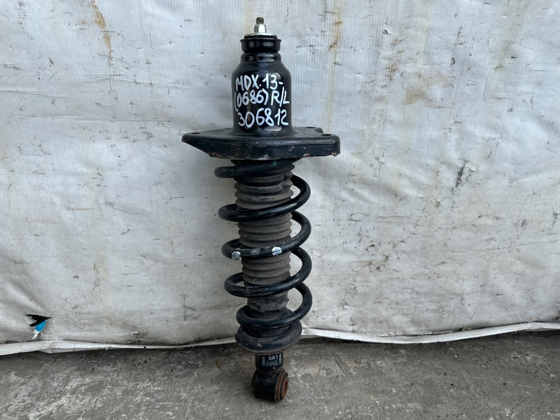 Амортизатор задний левый ACURA MDX (YD3) 13-21 2018 3.5 J35Y5 52611-TZ5-A12 Б/У