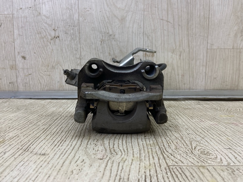 Суппорт тормозной задний левый TOYOTA PRIUS 16- 1.8 2ZRFXE