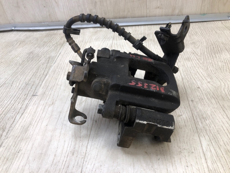 Суппорт тормозной задний левый GRAND CARAVAN 08-