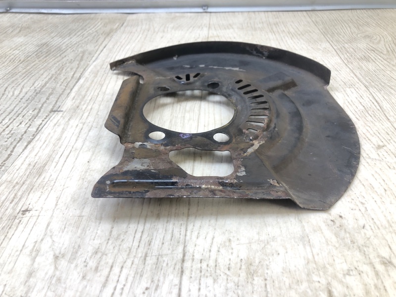 Защита тормозного диска передняя левая NISSAN NV200 USA 13-