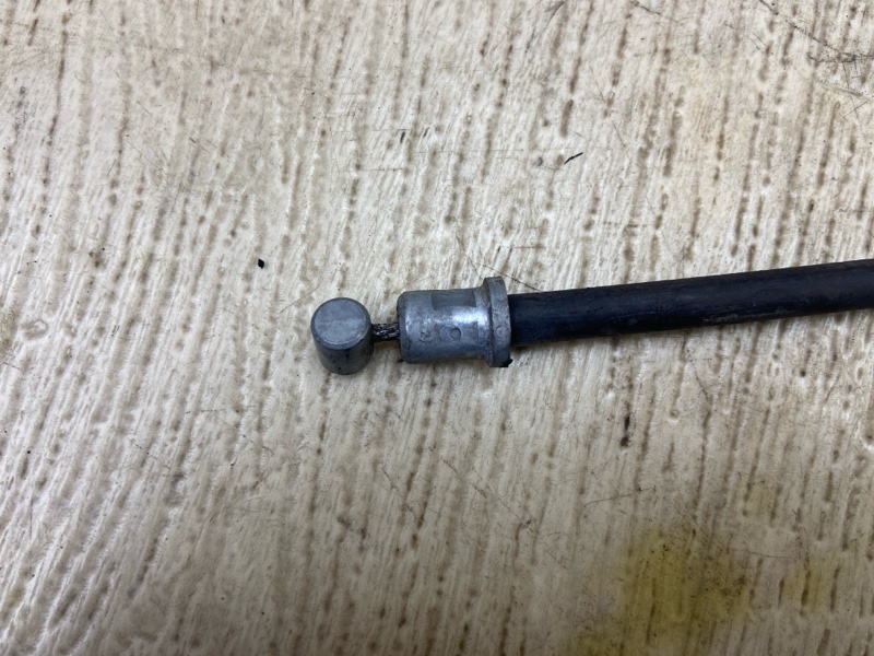 Трос стояночного тормоза левый OUTLANDER XL 05-13 2007 2.4 4B12