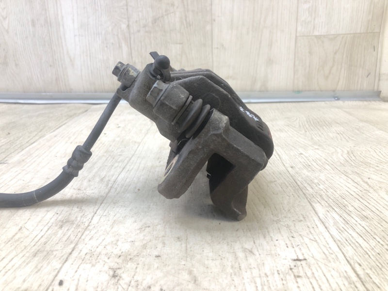 Суппорт тормозной задний левый FORTE/CERATO TD 08-13 2009 TD 2.0 G4KD Суппорт тормозной задний левый FORTE/CERATO TD 08-13 2009 TD 2.0 G4KD