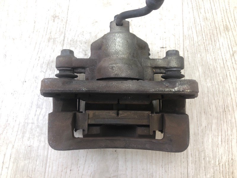 Суппорт тормозной задний левый FORTE/CERATO TD 08-13 2009 TD 2.0 G4KD Суппорт тормозной задний левый FORTE/CERATO TD 08-13 2009 TD 2.0 G4KD