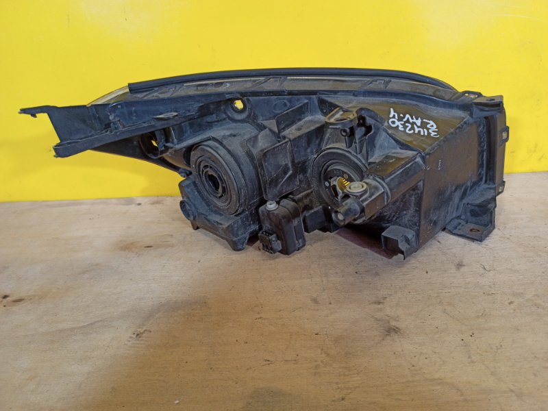 Фара левая RAV4 05-12