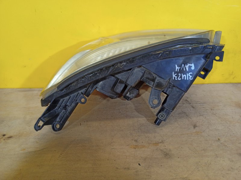 Фара левая RAV4 05-12