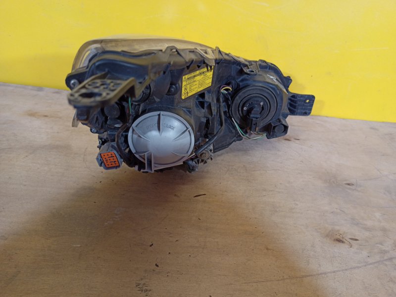 Фара левая OUTBACK 09-14 BR