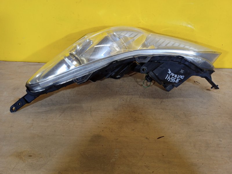 Фара левая OUTBACK 09-14 BR