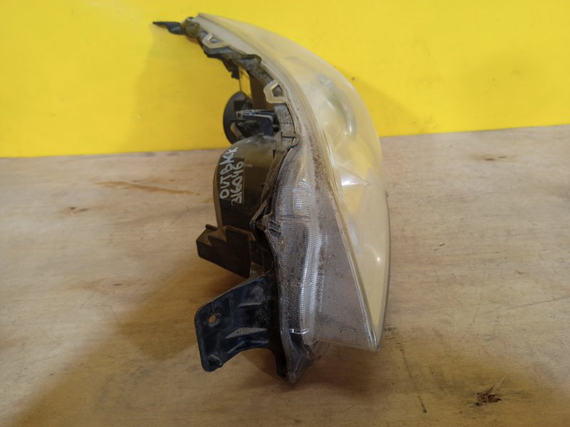 Фара левая OUTBACK 09-14 BR