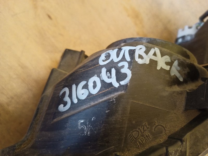 Фара левая OUTBACK 09-14 BR