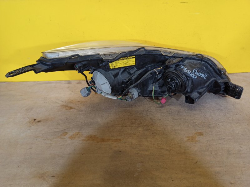 Фара левая OUTBACK 09-14 BR