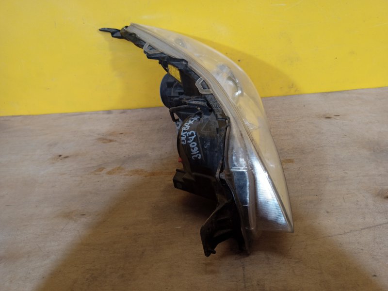 Фара левая OUTBACK 09-14 BR