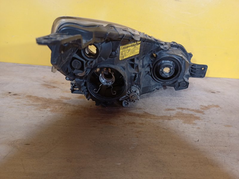 Фара левая OUTBACK 09-14 BR