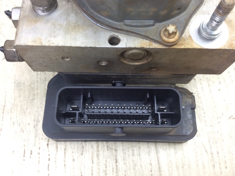 Блок ABS GRAND CARAVAN 08-