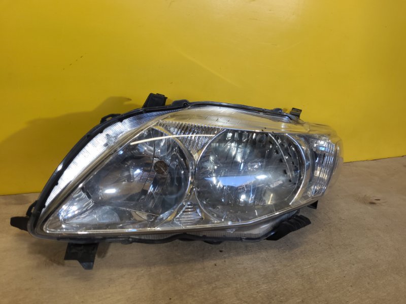 Фара левая TOYOTA COROLLA 150 06-13