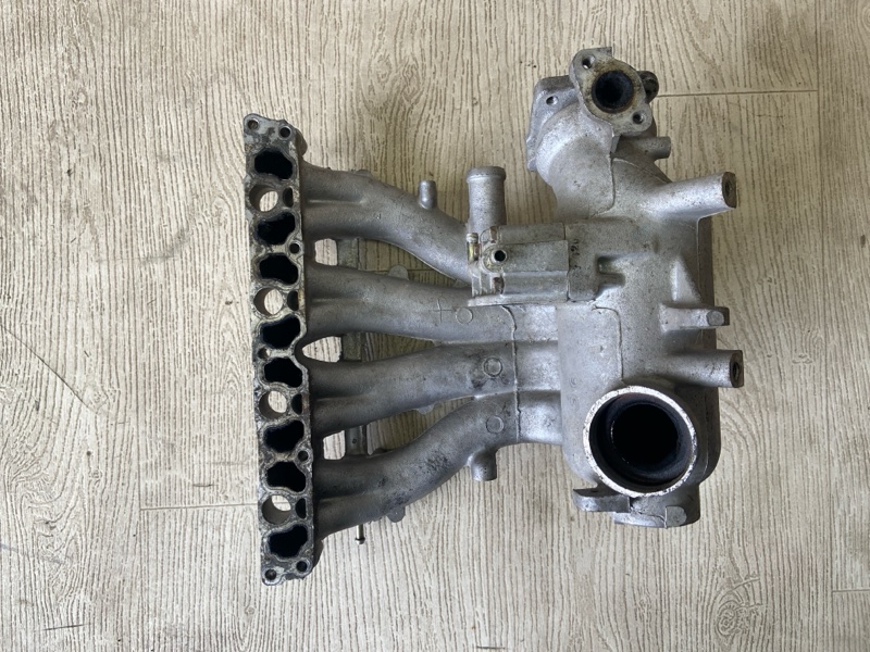Коллектор впускной CARISMA 95-04 1.8 GDI