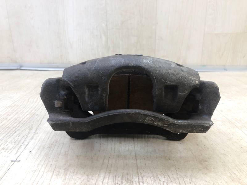 Суппорт тормозной передний левый GRAND CARAVAN 08-