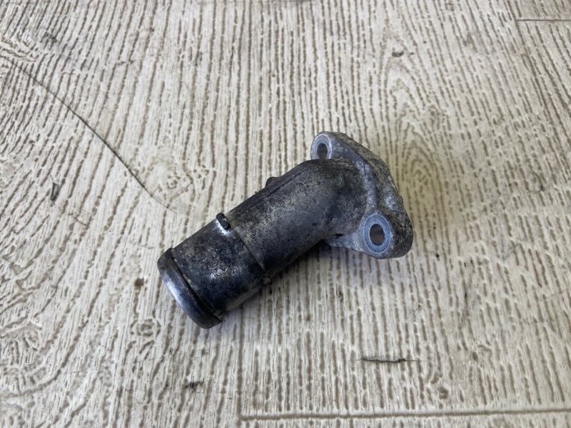 Запчасть фланец системы охлаждения MITSUBISHI CARISMA 95-04 1.8 GDI MD310105 Б/У Фланец системы охлаждения MITSUBISHI CARISMA 95-04 1.8 GDI MD310105 Б/У