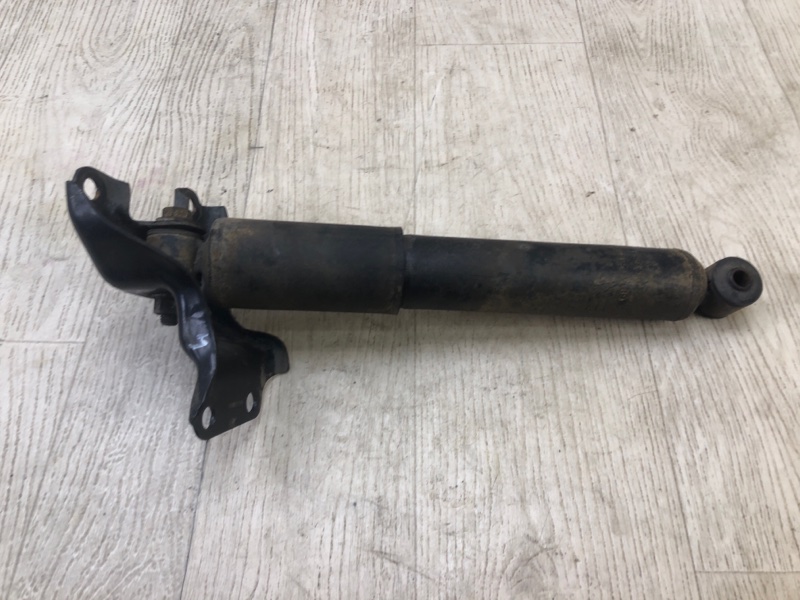 Амортизатор задний левый GRAND CARAVAN 08-