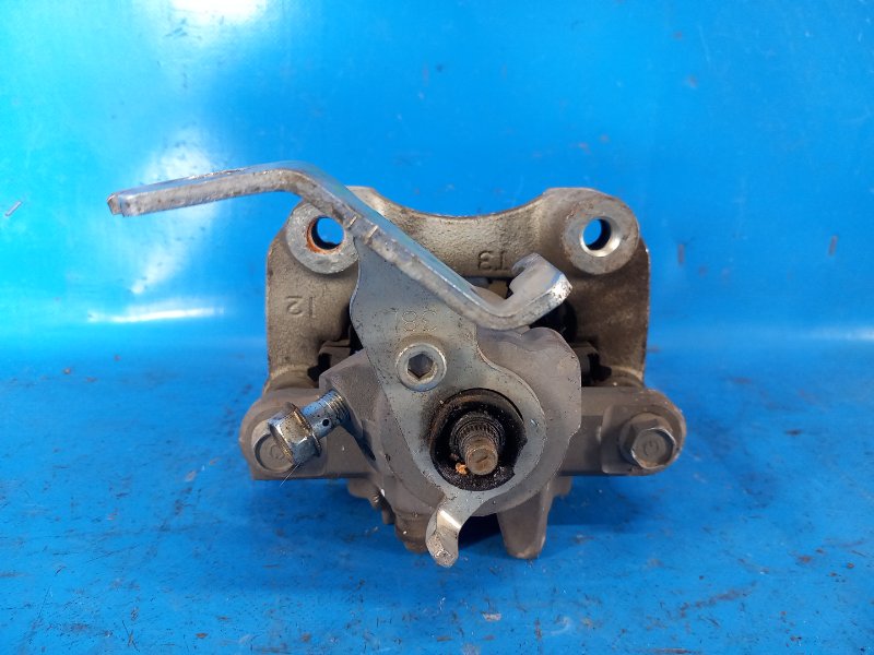 Суппорт тормозной задний левый PRIUS 16- 2017 XW50