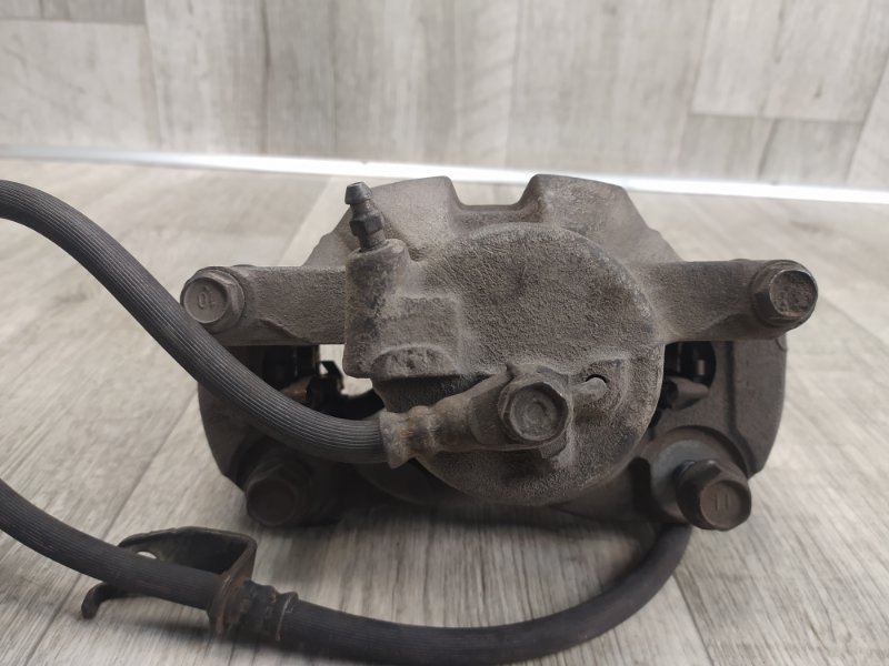 Суппорт тормозной передний левый TOYOTA RAV4 05-12 2.4