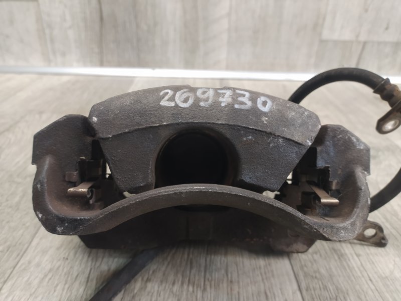 Суппорт тормозной передний левый RAV4 05-12 2.4