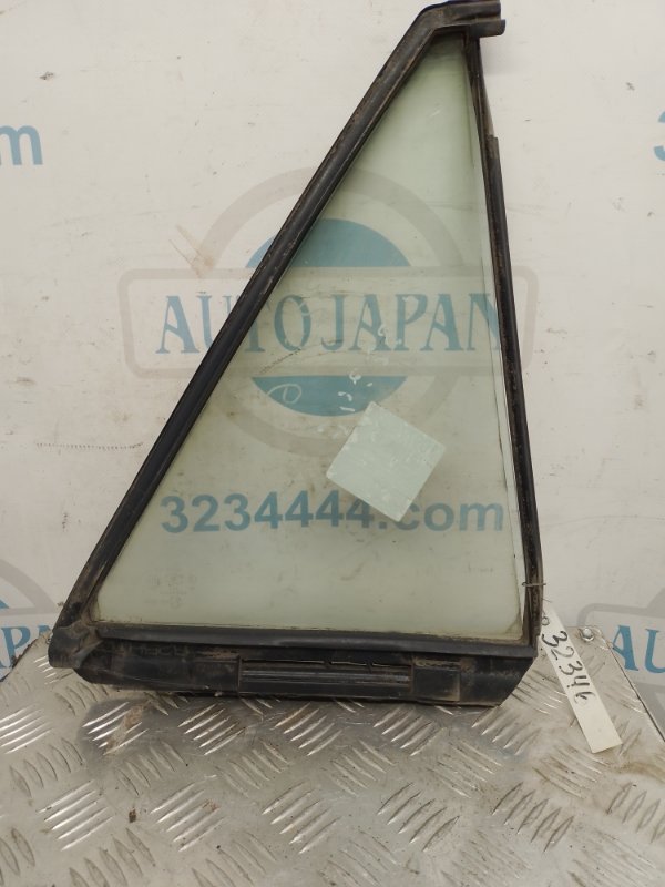Стекло двери глухое заднее левое MAZDA 323 BJ 98-2003