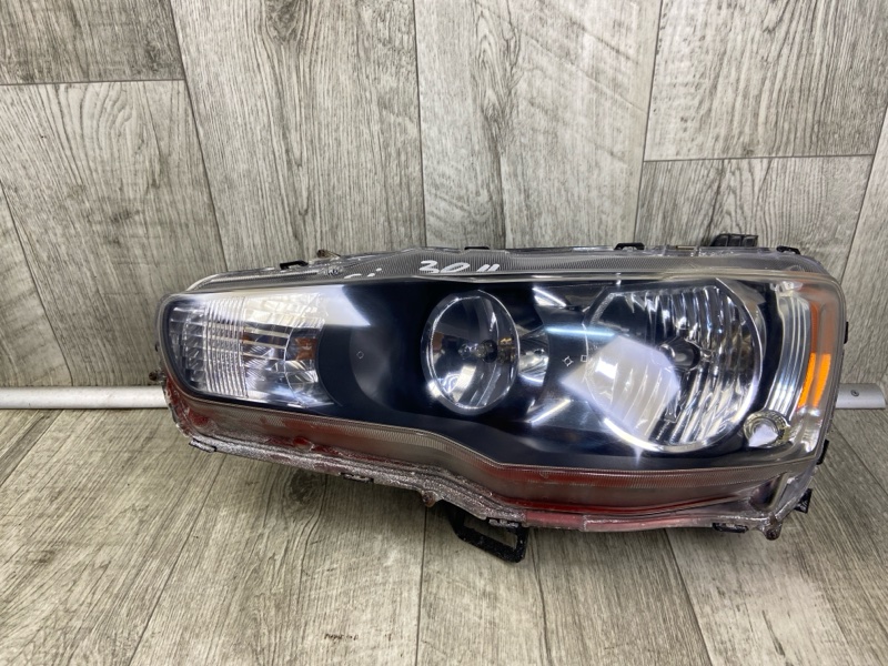 Запчасть фара левая MITSUBISHI LANCER X 10 07-15 2010 2.0 4B11 8301B861 Б/У Фара левая MITSUBISHI LANCER X 10 07-15 2010 2.0 4B11 8301B861 Б/У