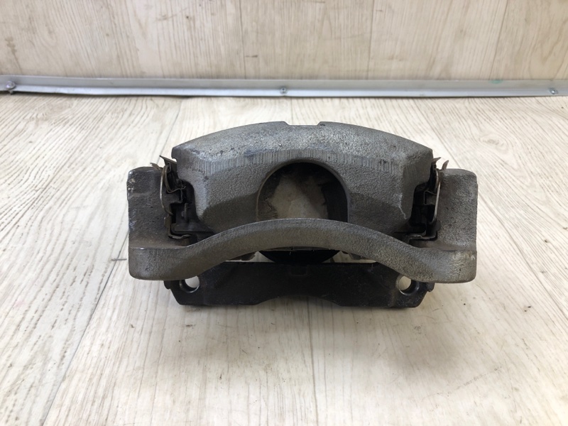 Суппорт тормозной передний левый X-TRAIL/ROGUE T32 13-20 2017 2.5 QR25DE