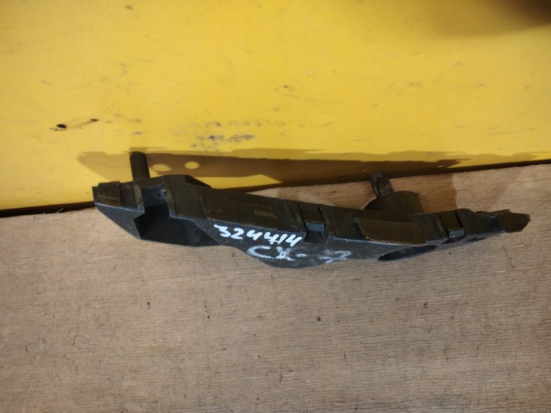 Кронштейн переднего бампера левый CX-7 06-12