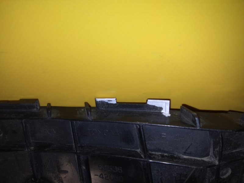 Кронштейн переднего бампера левый RAV4 13-19