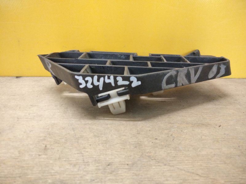 Кронштейн переднего бампера правый HONDA CRV 02-06