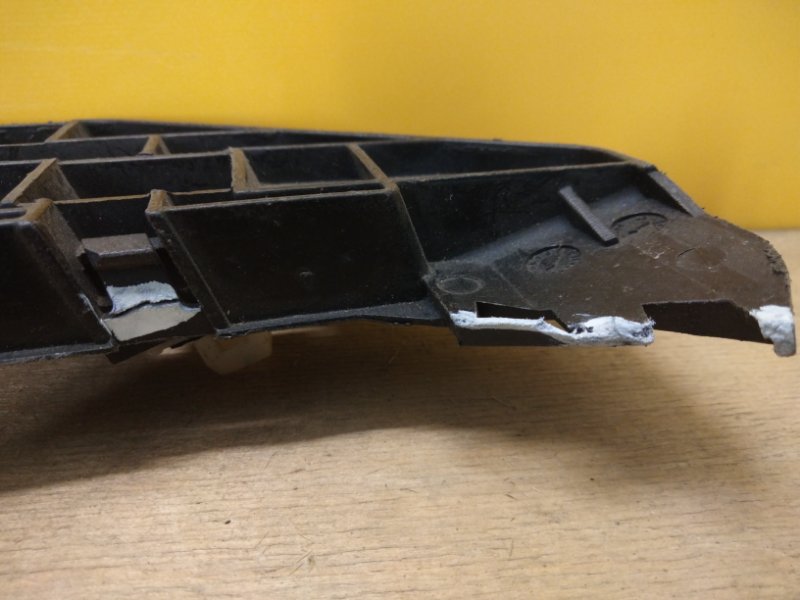 Кронштейн переднего бампера левый CRV 02-06