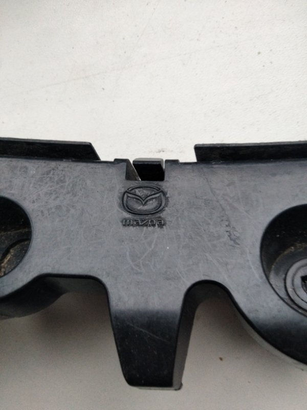 Кронштейн заднего бампера левый 6 GJ 12-