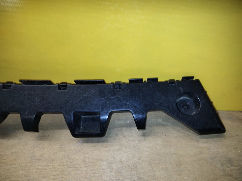 Кронштейн заднего бампера левый 6 GJ 12-