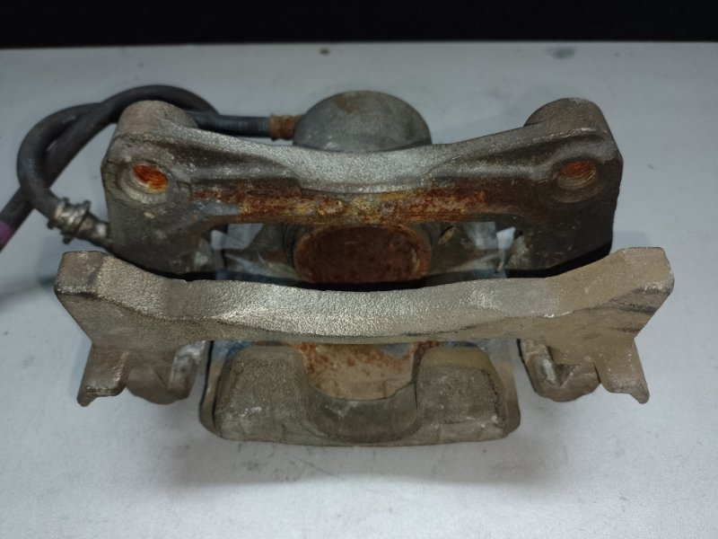 Суппорт тормозной передний левый ALTIMA 19- 2019 L34 PR25DD