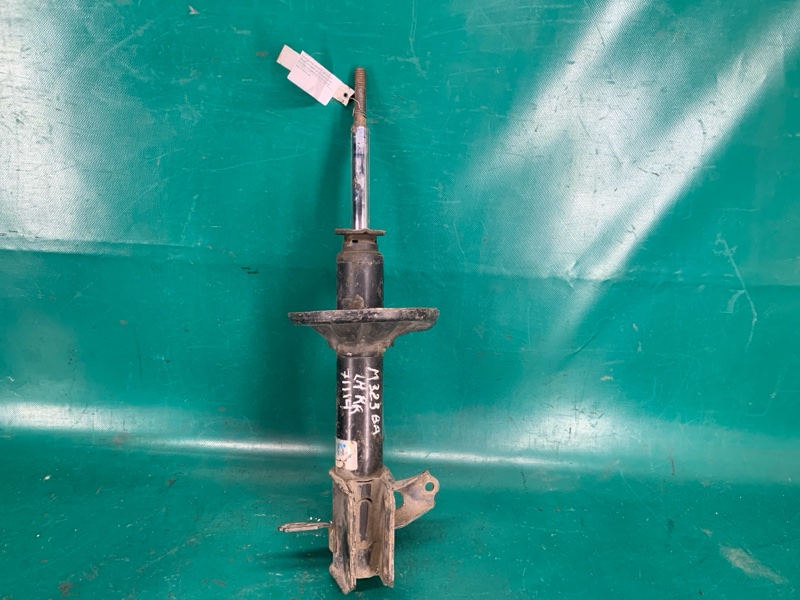 Амортизатор задний левый MAZDA 323 BA 94-97