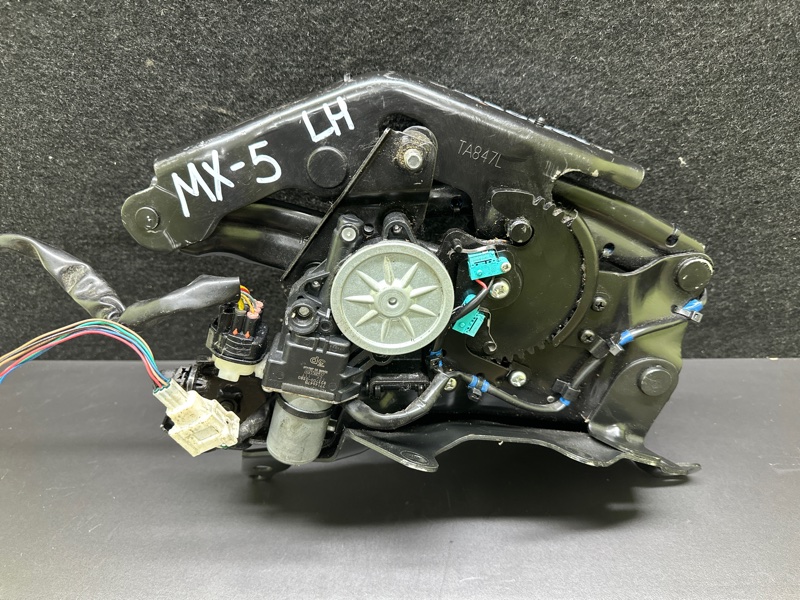 Механизм складывания крыши левый MX-5 15-