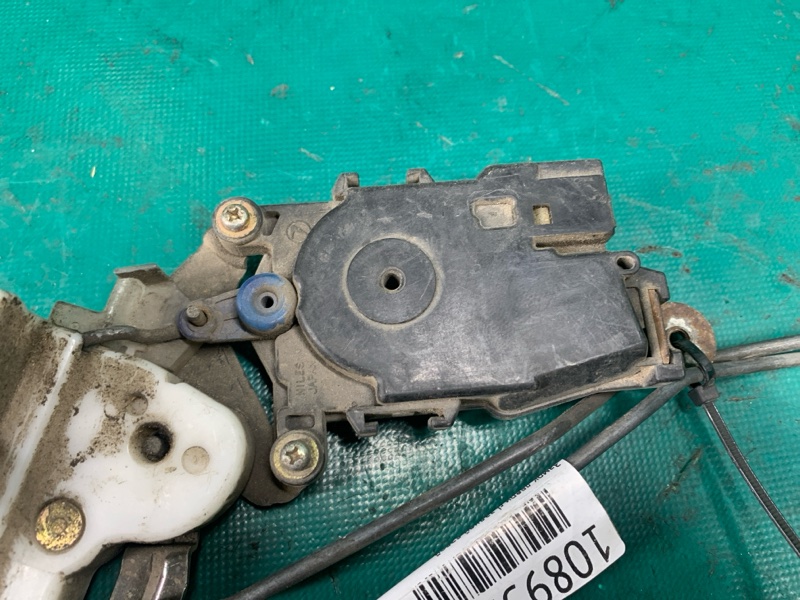 Замок двери задний левый FORESTER SF 97-02