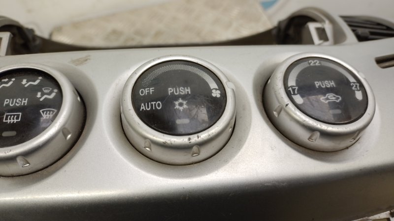 Накладка торпедо под магнитолу L200 06-14