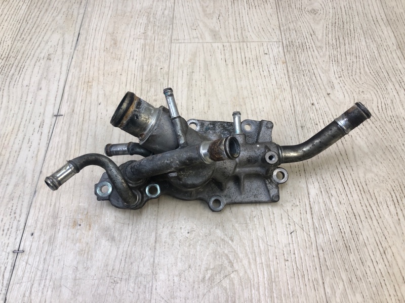 Корпус термостата NV200 USA 13- 2013 2.0 MR20DE