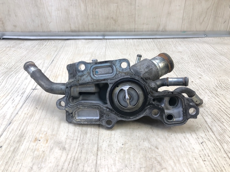 Корпус термостата NV200 USA 13- 2013 2.0 MR20DE