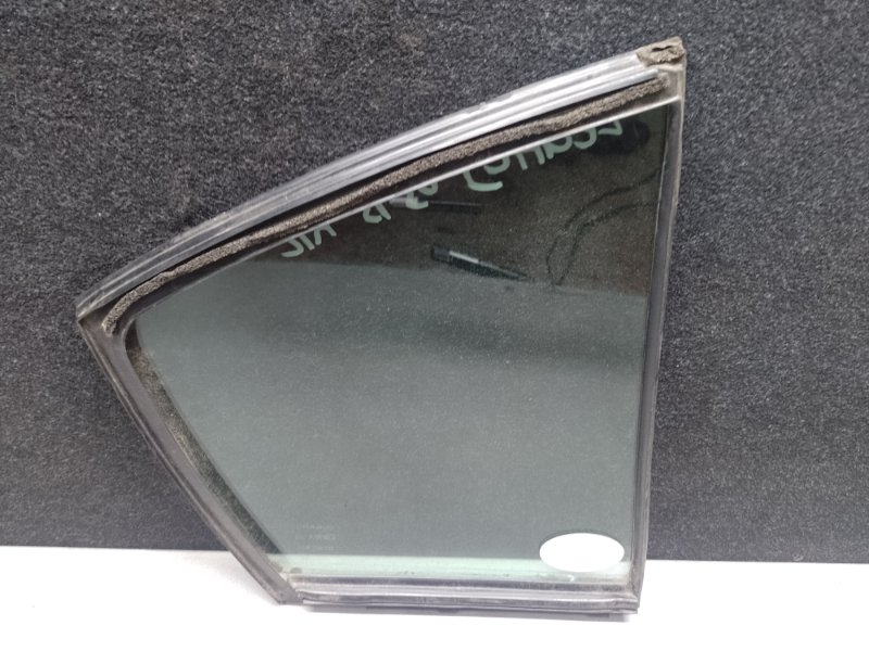 Стекло двери глухое заднее левое LEGACY 09-15 BM