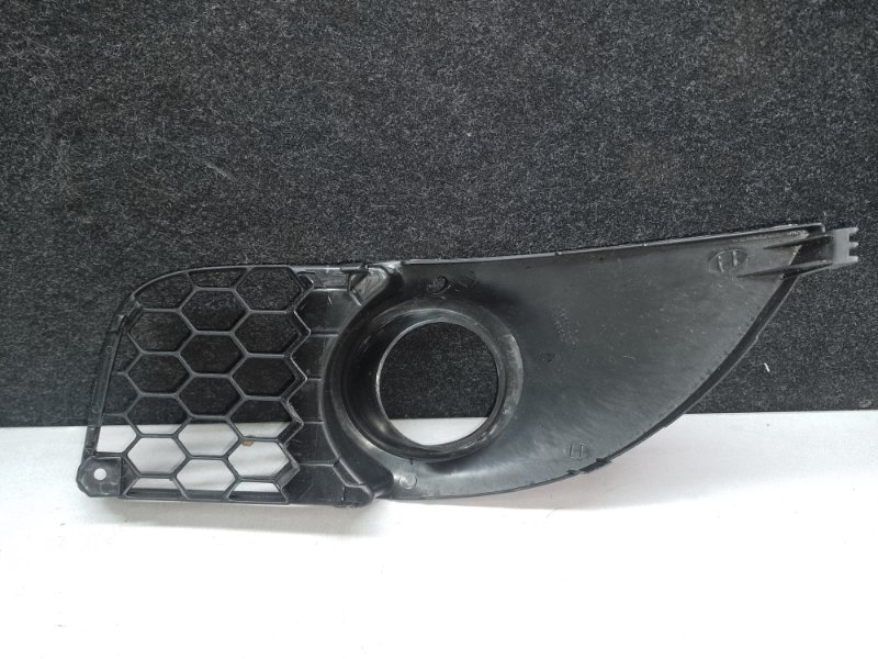 Накладка противотуманной фары левая LANCER X 10 07-15