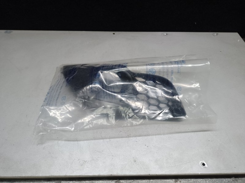 Накладка противотуманной фары левая LANCER X 10 07-15