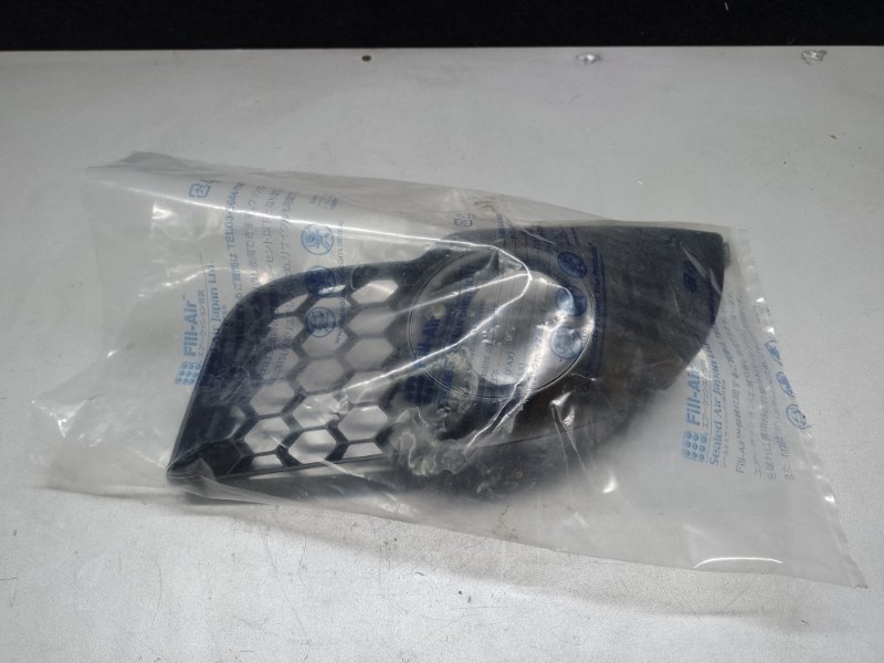 Накладка противотуманной фары правая LANCER X 10 07-15