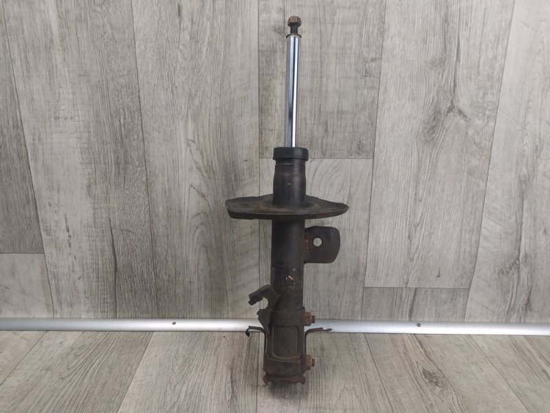 Амортизатор передний правый NV200 USA 13- 2015 M20XUS 2.0 MR20DE