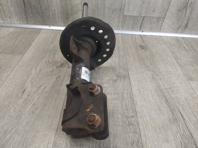 Амортизатор передний правый NV200 USA 13- 2015 M20XUS 2.0 MR20DE