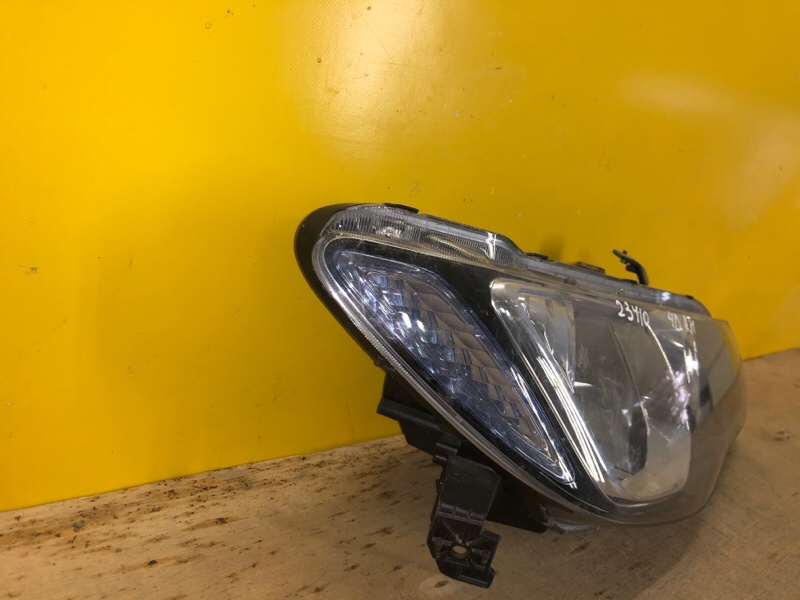 Фара правая HONDA CIVIC 4D 06-11
