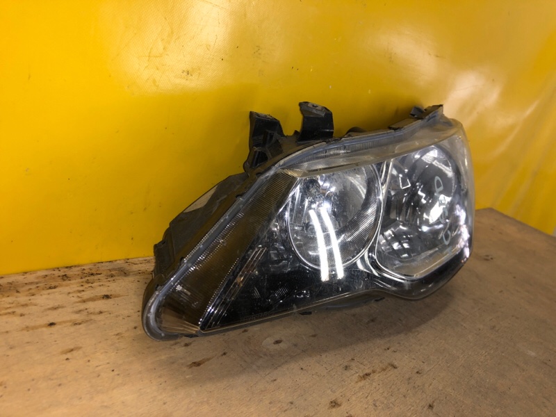 Фара левая HONDA CIVIC 4D 06-11