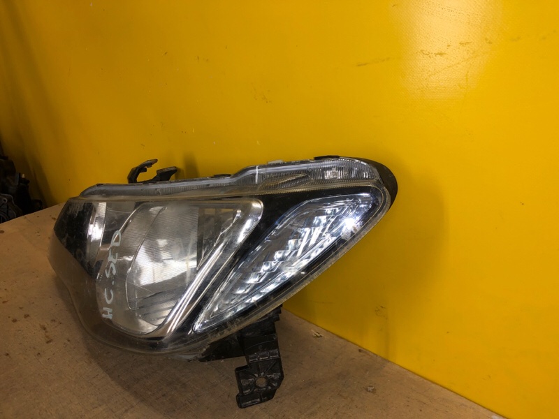 Фара левая CIVIC 4D 06-11
